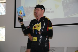 Carey Grammar teacher Nathan Jones talks to the students about Tour De Cure book 'Stickman Rules'.